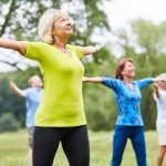 Seniors in a yoga or gym class
